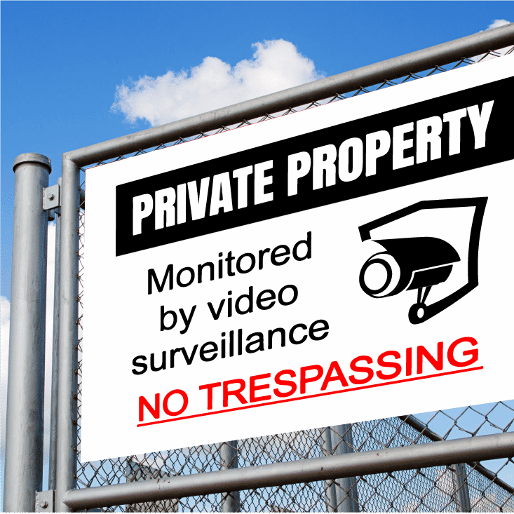 CCTV sign on fence