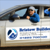 magnetic car sign on car door showing company name, logo and contact details