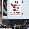 magnetic sign on the side of generator showing company name, logo and contact details