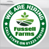 magnetic Van signs on a Van showing staff wanted message and contact details